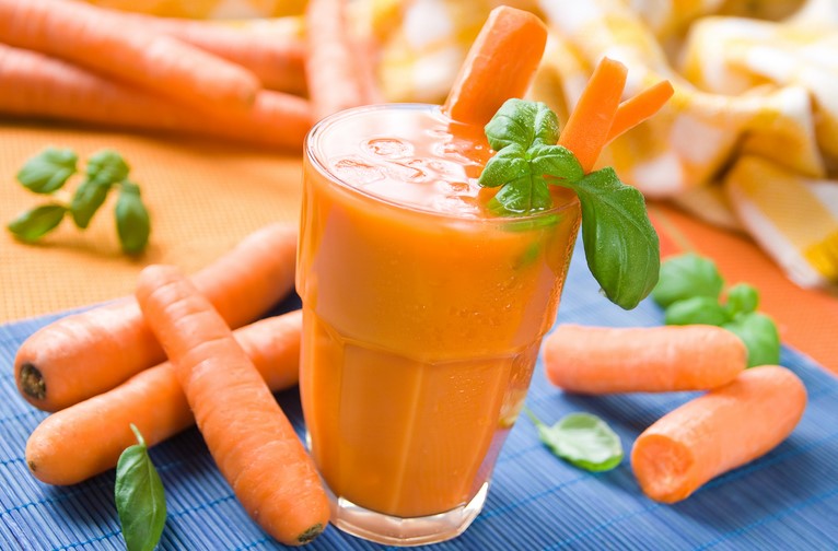 What are the side effects of carrot juice?